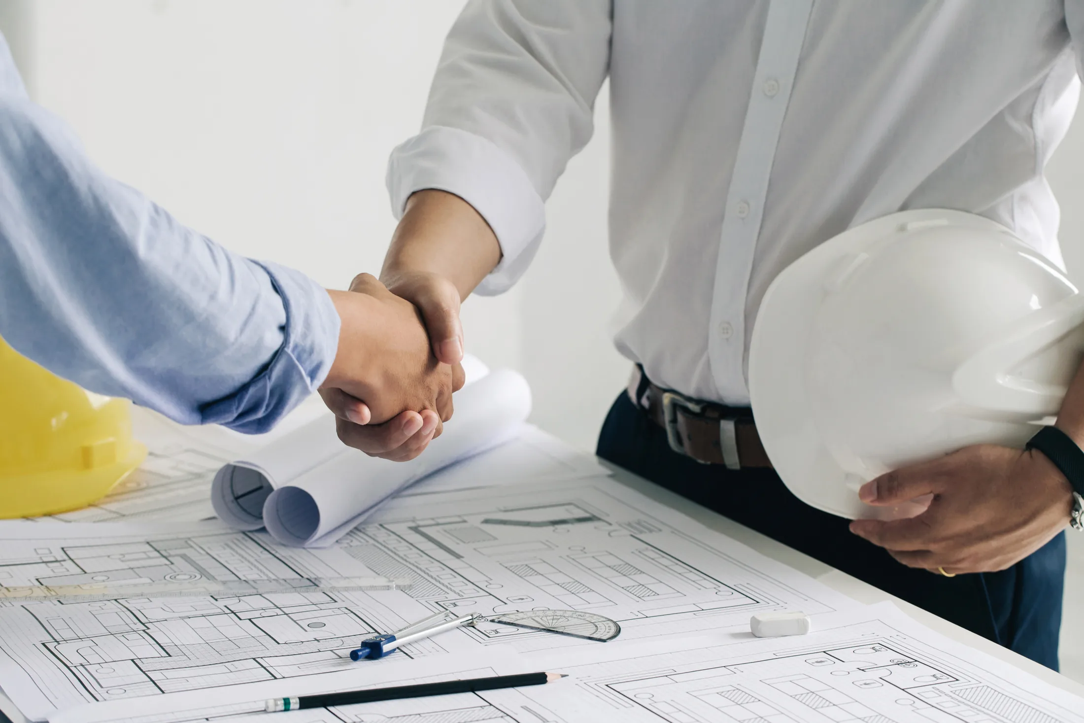 Construction professionals reviewing project plans